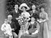 Couple in the back row, right, Roberth Ernest and Maud Mary (Arnsby) Draper, seated on a lap, young son Thomas Draper
